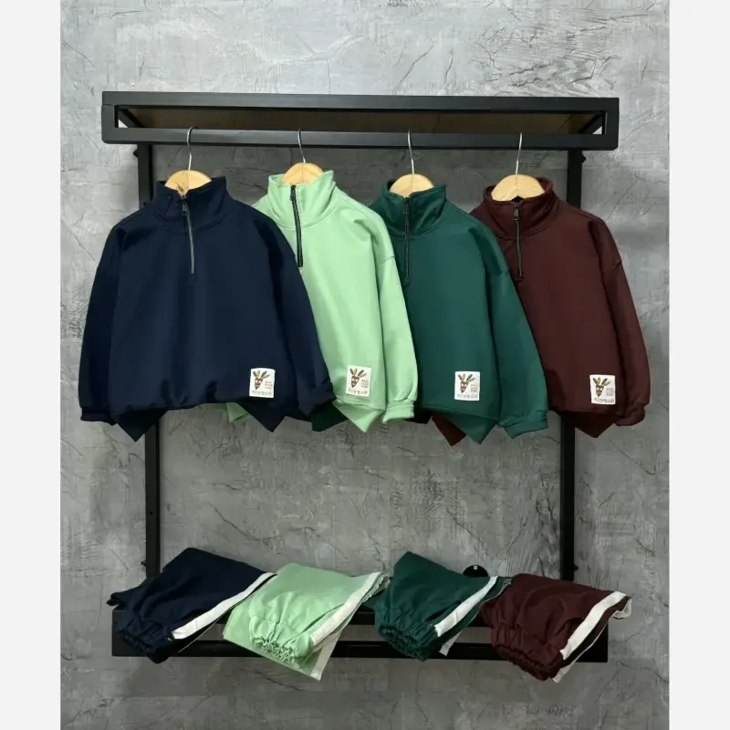 ست بلوز و شلوار اسپرت بچگانه نیم زیپ پنبه دورس دو نخ لاکرادار سایز 45 تا 65